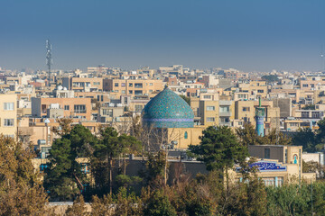 Aerial view of residential building skyline with blue tome of Lonban Mosque of Isfahan of Iran, one...