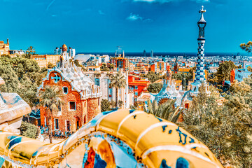 BARCELONA, SPAIN - SEPT 02,2014 :Gorgeous and amazing Park Guel in Barcelona. In 1984 park has been declared UNESCO by the World heritage of mankind. Park Guell (1914)  - obrazy, fototapety, plakaty