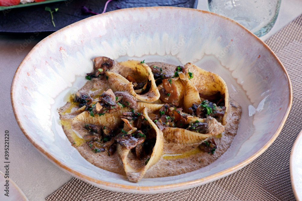 Wall mural shell pasta (conchiglie pasta )  with sauteed mushroom and creamy truffle sauce