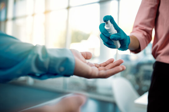 Close-up of hands disinfection during coronavirus pandemic.