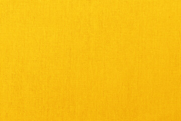 Yellow golden cotton fabric texture background, seamless pattern of natural textile.