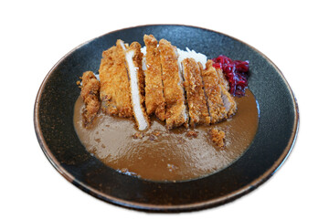 Isolated dish of Japanese pork Tonkatsu curry rice