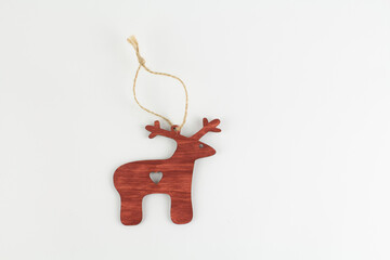 wooden deer for christmas tree on white