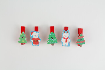 christmas clothespin on white with christmas tree