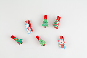 christmas clothespin on white with christmas tree