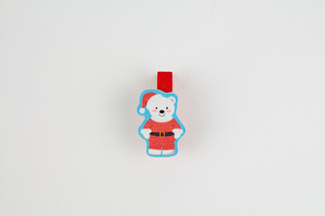 santa claus on a clothespin on a white background
