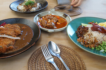 Gyudon served with Pork Tonkatsu, Japanese beef Kare curry and Shrimp paste fried rice served with mixed vegetables and sweetened pork