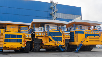 The worlds biggest truck with electric drive system consisting of four electric motors. Mining two-axle all-wheel-drive dump truck with weight-carrying capacity of 450 metric tons. 