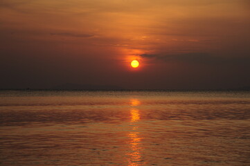 Fototapeta na wymiar Sunset on the ocean, abstract environmental backgrounds