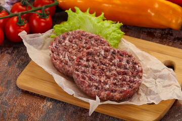 Raw burger cutlet