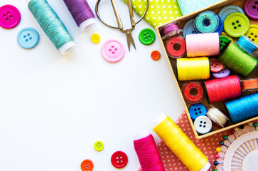 Sewing accessories on a white background