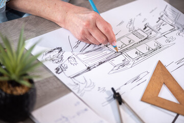 Female architect working on sketch