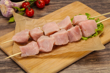 Raw pork meat skewer for grill