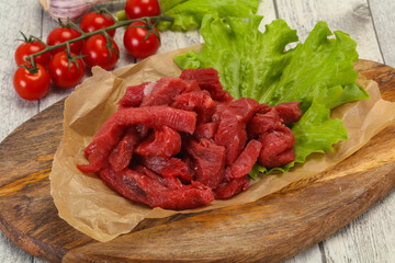 Raw beef meat sliced for cooking