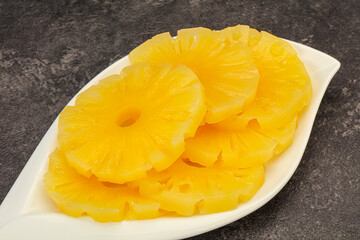 Marinated pineapple rings in the bowl