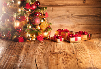 Santa Claus day concept. Christmas decoration in golden and brownish aesthetics and Santa’s hat. Place for typography or text. 
