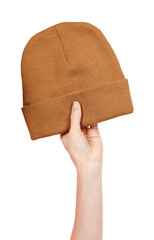 Hand with brown wool winter hat isolated on white background.