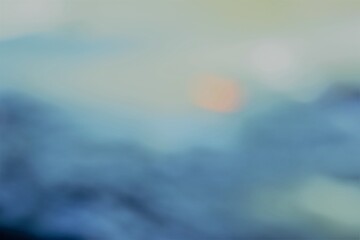 Abstract nature, blue bokeh of the sunrise at dawn used for a background. Use as seamless texture...