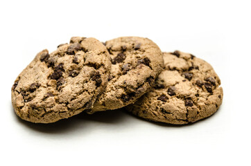 Close-up of homemade chocolate chip cookies isolated on white background.
