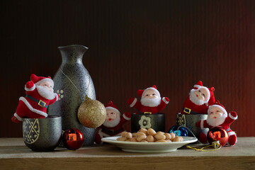 Sake whiskey of Japan and Santa claus in new year night 