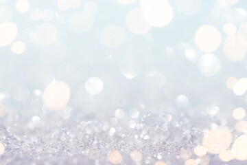 Abstract snow and glitter background with gold lights