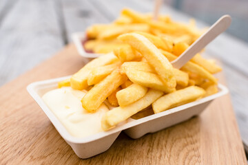 french fries with wooden fork