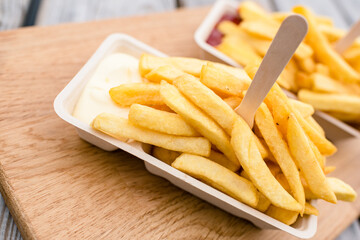 french fries with wooden fork