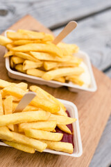 french fries with wooden fork