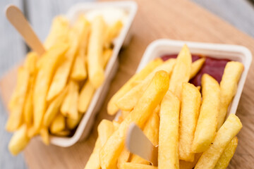 french fries with wooden fork