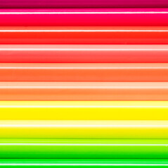 The texture of colored wooden pencils closeup