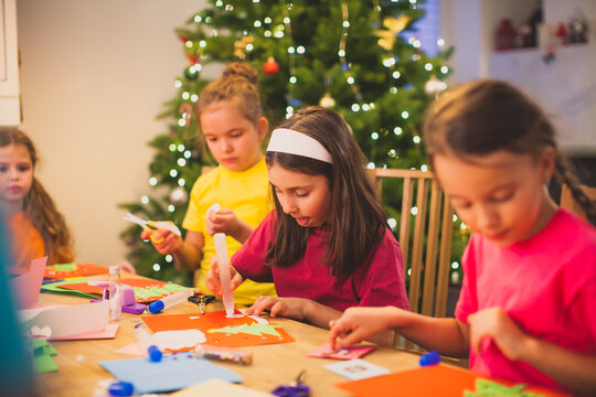 Cooperation and support between kids while Christmas workshop