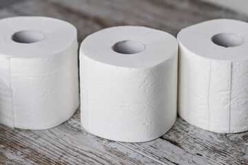 A group of white toilet paper rolls