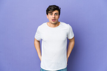 Young cool man being shocked because of something she has seen.