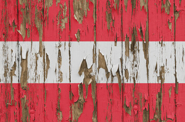 Flag of Austria on a weathered wooden wall