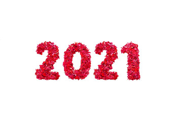 Figures 2021 made of red glitter on white background
