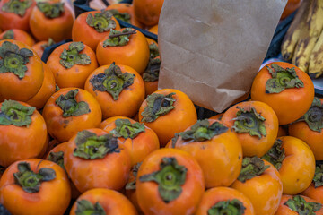 Orange palm fruit at the farmers market.