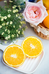 Ripe Navel orange and flower