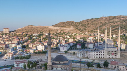 Fototapeta premium Aerial view to mosques from old castlethe in historical city town of Nevsehir timelapse