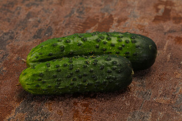 Ripe fresh green two cucumbers