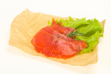 Sliced salmon fillet served rosemary