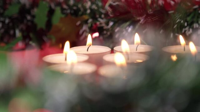 Christmas candles in red background. Decoration for holiday celebration