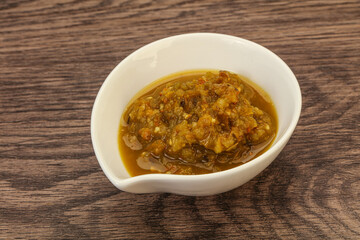 Green spicy sauce in the bowl