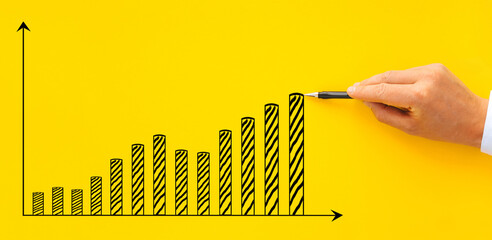 businessman drawing  increase graph. 