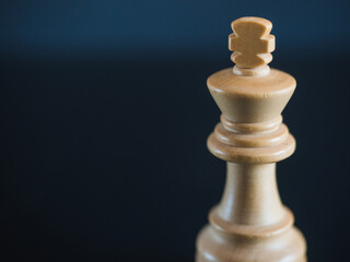 White king, wooden chess figure isolated. Concept strategy leadership with copy space