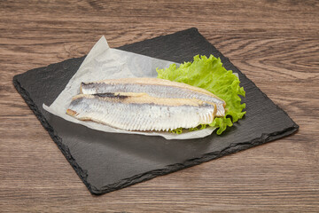 Herring fillet with salad leaves