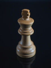 White king, wooden chess figure isolated. Concept strategy leadership