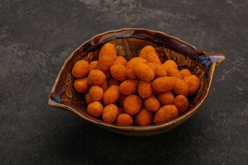 Spicy peanut heap in the bowl