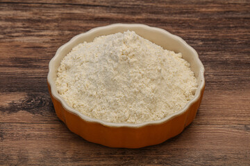 Wheat flour heap in the bowl