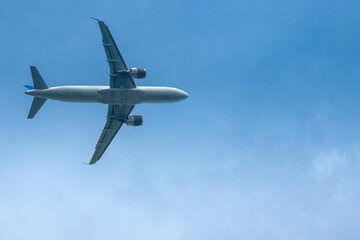 Fototapeta na wymiar Jet aircraft against the sky