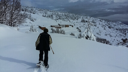 skiing in the mountains
